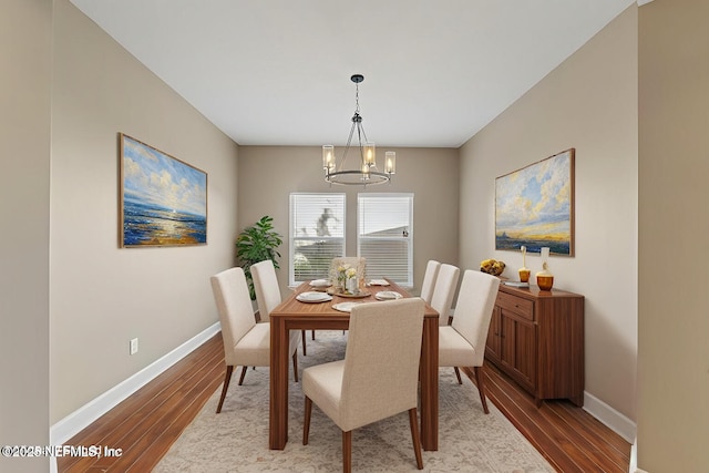 3370 Turkey Creek Dr, Green Cove Springs, FL 32043 - dining room featuring a chandelier, baseboards, and light wood-style floors