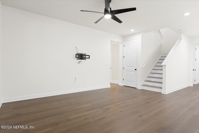 empty room featuring ceiling fan and dark hardwood / wood-style floors