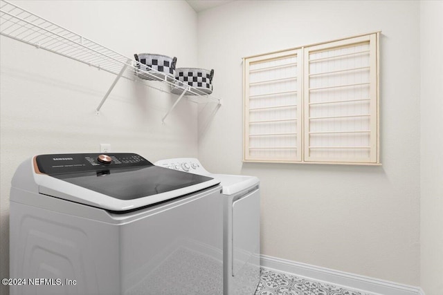 laundry area featuring independent washer and dryer