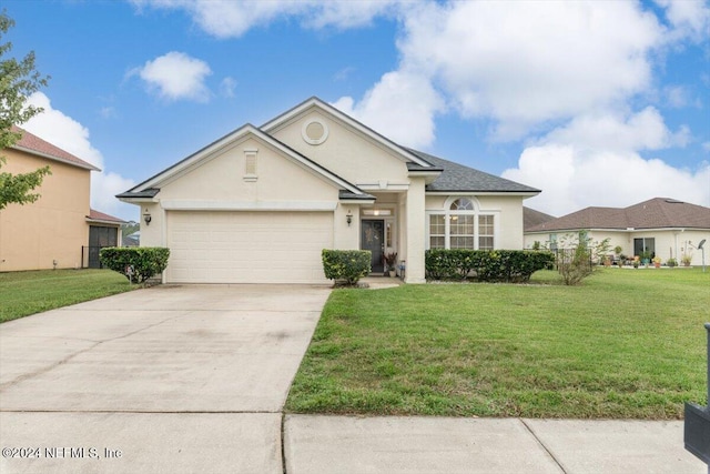 ranch-style home with a front yard and a garage