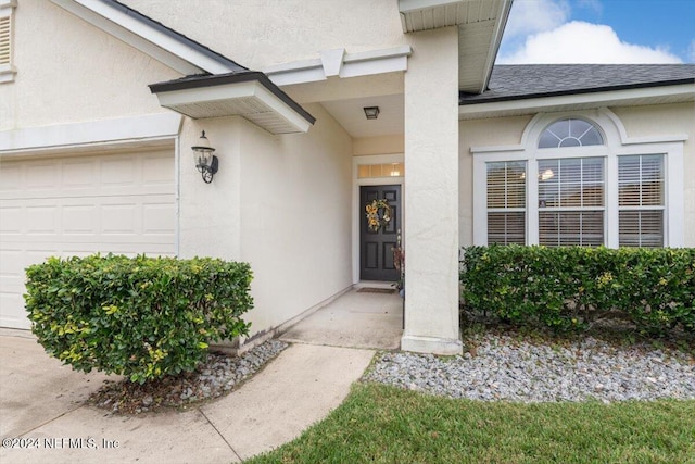 entrance to property with a garage