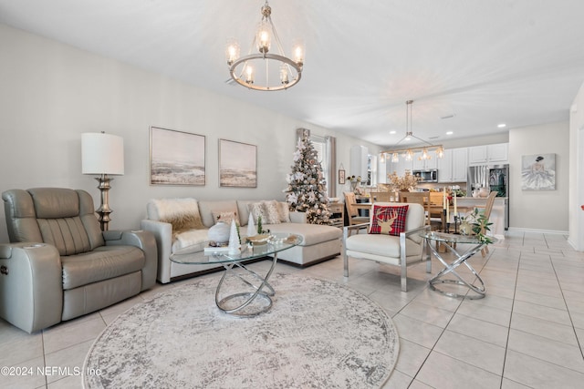 tiled living room with an inviting chandelier