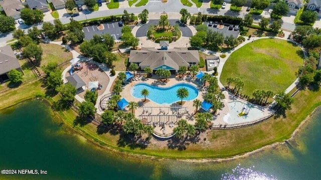 birds eye view of property featuring a water view