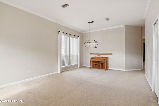 carpeted empty room featuring crown molding and a notable chandelier