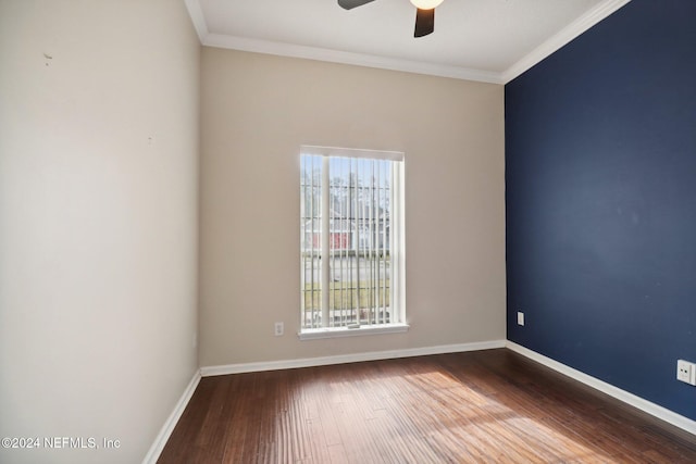 empty room featuring ceiling fan, wood-type flooring, and ornamental molding