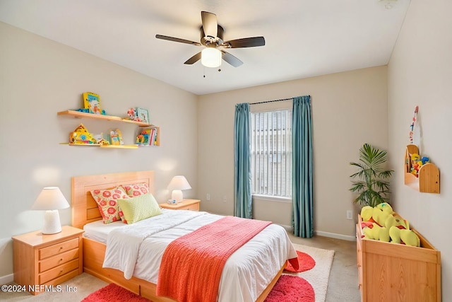 carpeted bedroom with ceiling fan