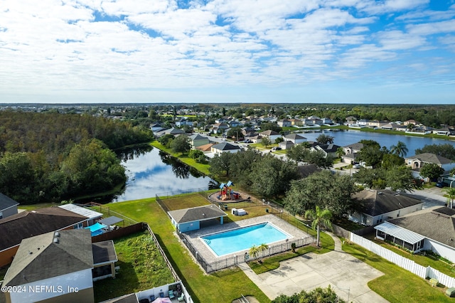 drone / aerial view with a water view