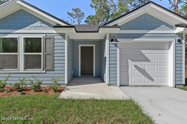 property entrance featuring a garage