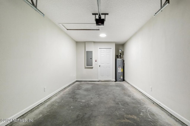 garage featuring a garage door opener, electric water heater, and electric panel