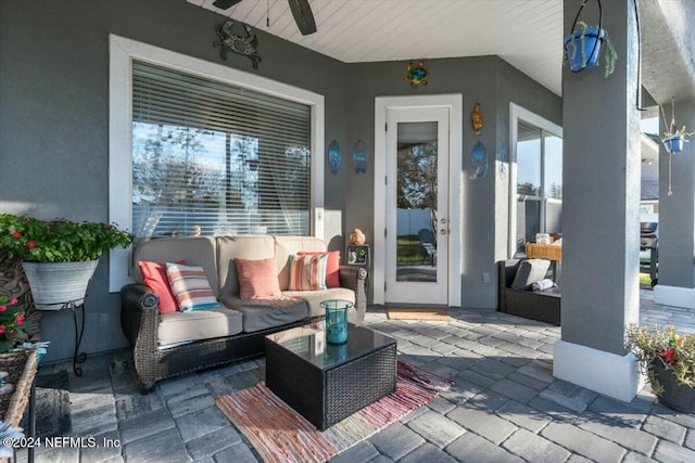 view of patio featuring ceiling fan