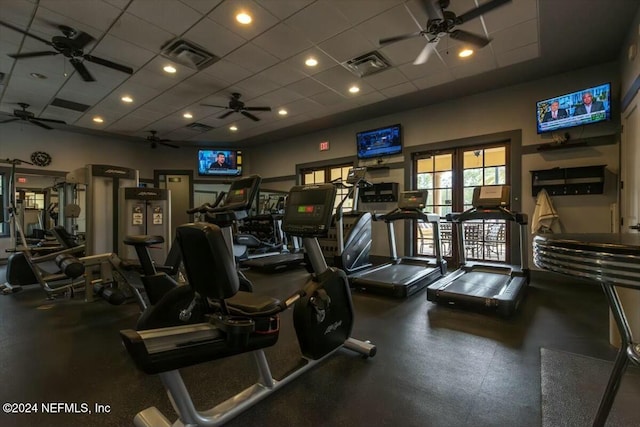 gym featuring french doors and a drop ceiling