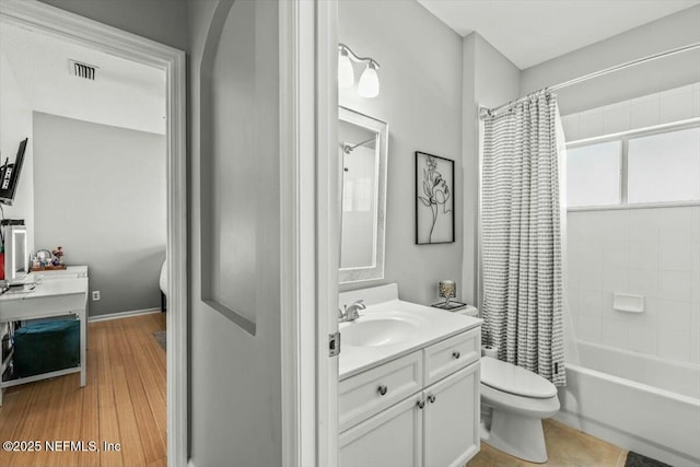 bathroom with tile patterned floors, toilet, vanity, shower / bath combo, and visible vents