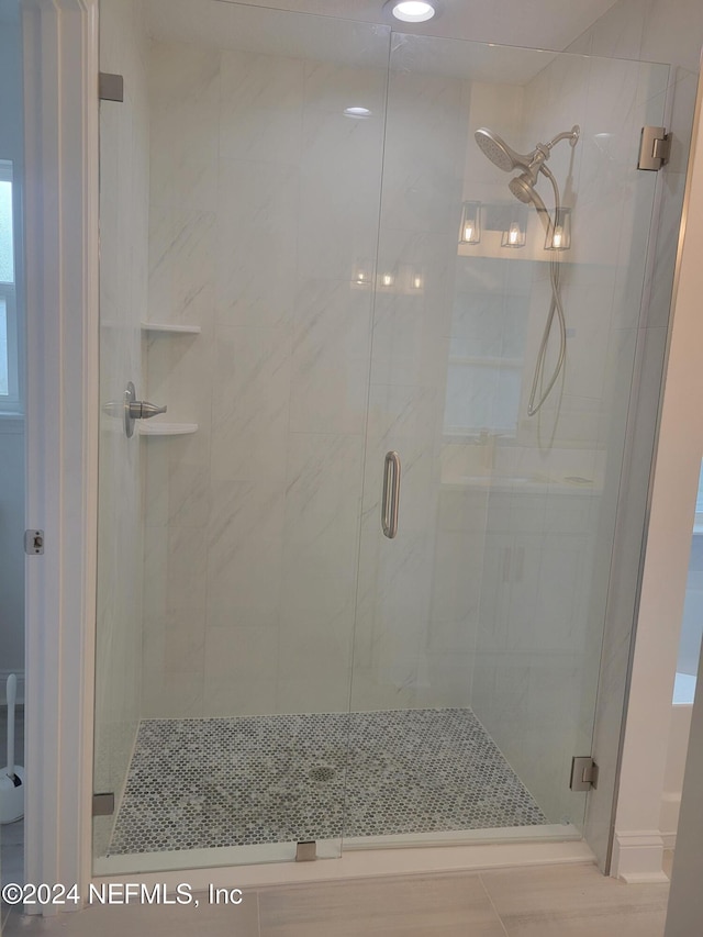 bathroom featuring walk in shower