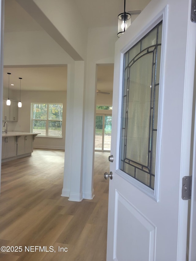 doorway to property with a sink