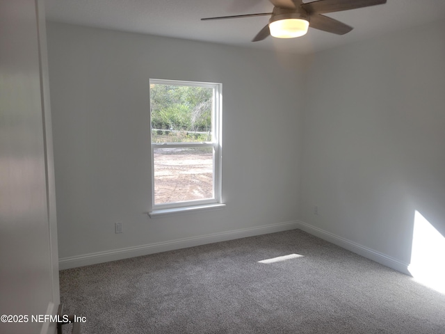 unfurnished room featuring ceiling fan, baseboards, and carpet floors