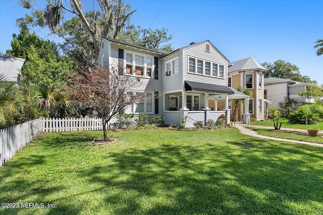 view of front facade with a front yard