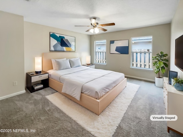 1421 Woodland View Dr, Fleming Island, FL 32003 - bedroom featuring carpet floors, baseboards, and ceiling fan