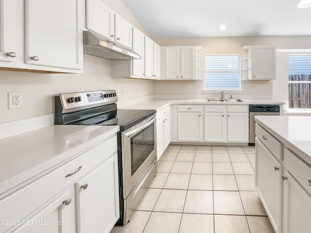 1421 Woodland View Dr, Fleming Island, FL 32003 - kitchen featuring plenty of natural light, a sink, appliances with stainless steel finishes, and under cabinet range hood
