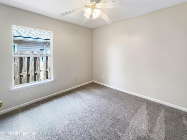 1421 Woodland View Dr, Fleming Island, FL 32003 - carpeted spare room featuring baseboards and a ceiling fan