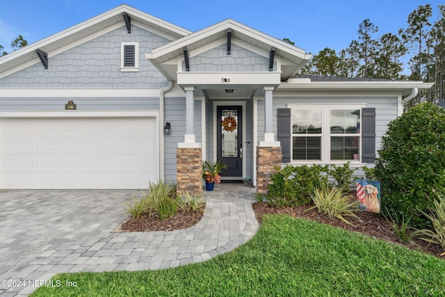 craftsman-style home featuring a garage