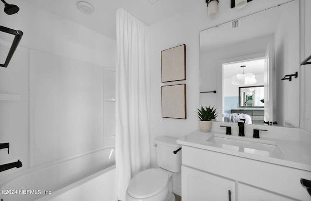 full bathroom featuring vanity, toilet, and shower / tub combo with curtain