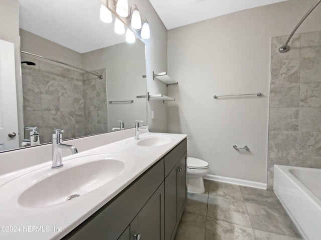 full bathroom with tile patterned floors, vanity, toilet, and tiled shower / bath