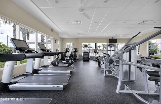 workout area with a paneled ceiling