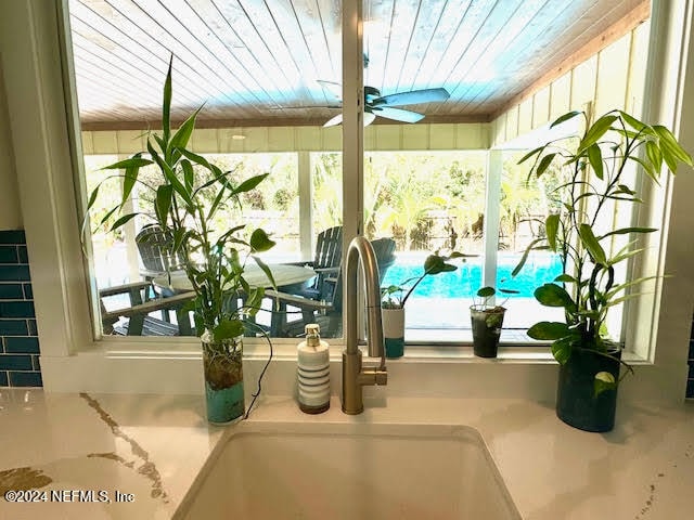 details with ceiling fan and sink