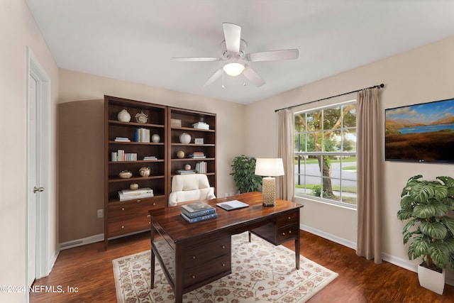 office area featuring dark hardwood / wood-style floors and ceiling fan