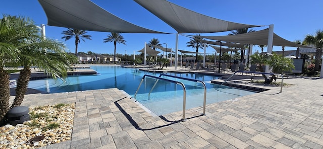 pool with a patio area