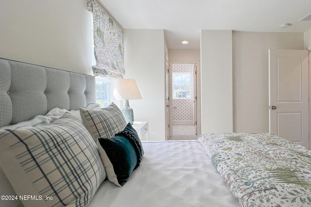 bedroom featuring connected bathroom