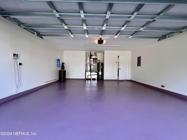 garage with electric panel, a garage door opener, and water heater