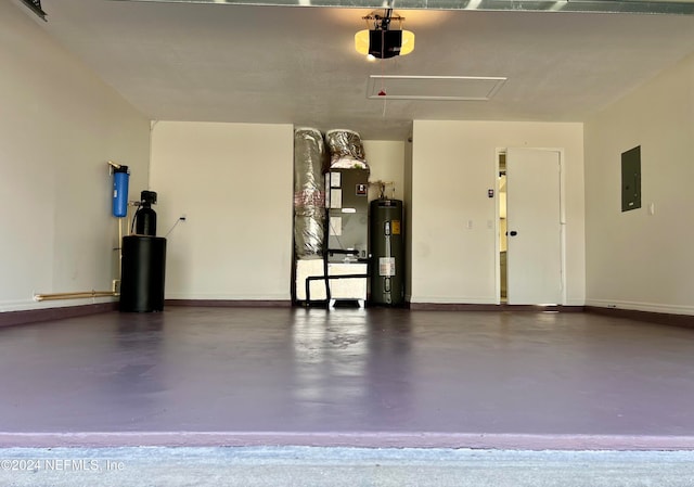 garage featuring electric panel, a garage door opener, and water heater