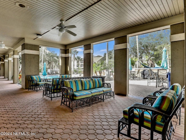 view of patio with an outdoor hangout area and ceiling fan