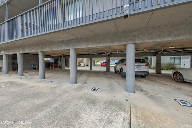 garage featuring a carport