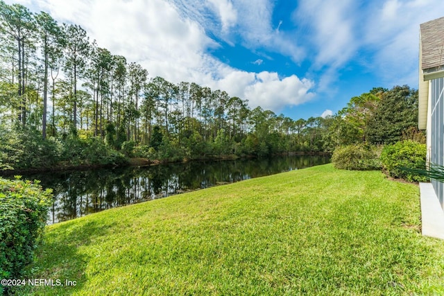 view of yard featuring a water view