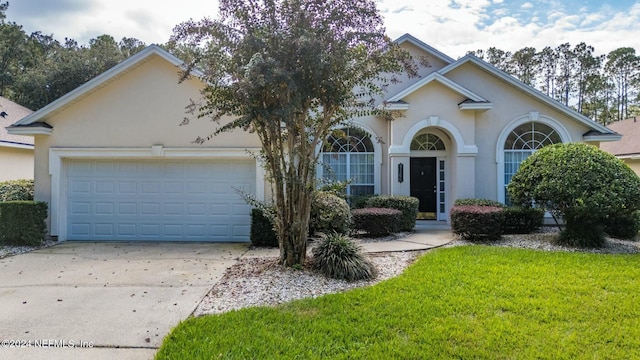 single story home featuring a garage