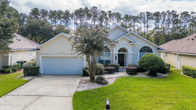 ranch-style house featuring a garage and a front lawn