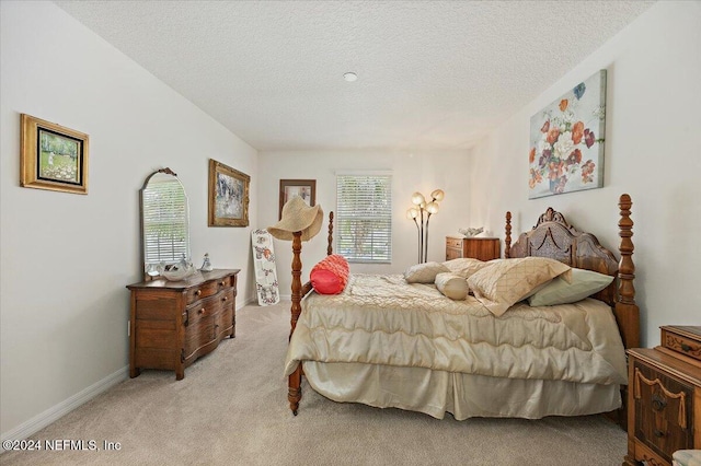 20 Sadie Ct, Saint Augustine, FL 32095 - bedroom featuring light carpet, a textured ceiling, and baseboards