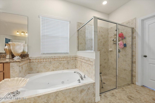 full bath featuring a whirlpool tub and a stall shower