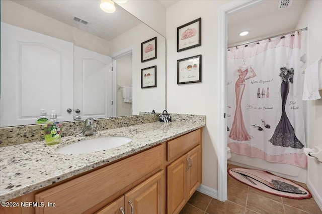 20 Sadie Ct, Saint Augustine, FL 32095 - bathroom with vanity, tile patterned flooring, baseboards, and toilet