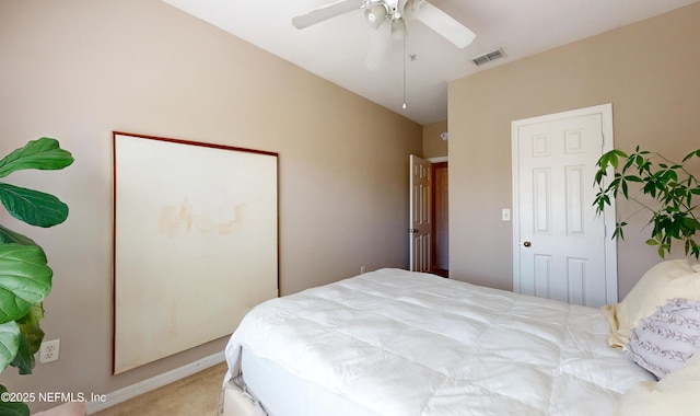 bedroom with light colored carpet and ceiling fan