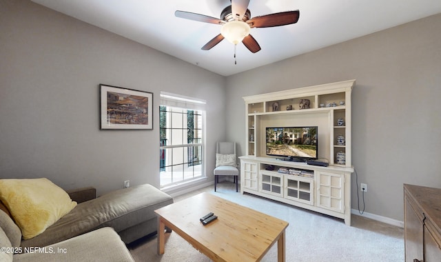 living room featuring ceiling fan and light colored carpet