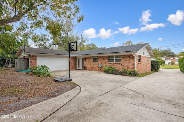 exterior space with a garage