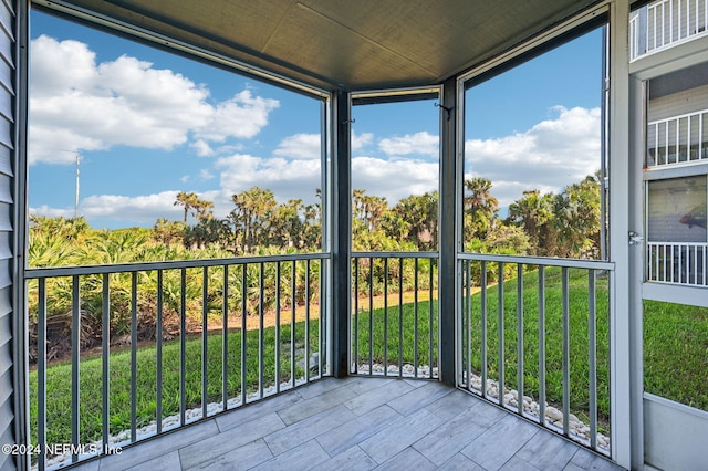 unfurnished sunroom with a wealth of natural light