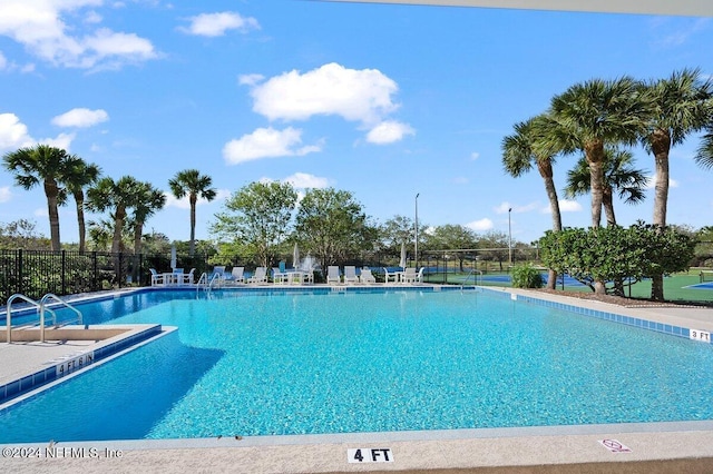 community pool with fence