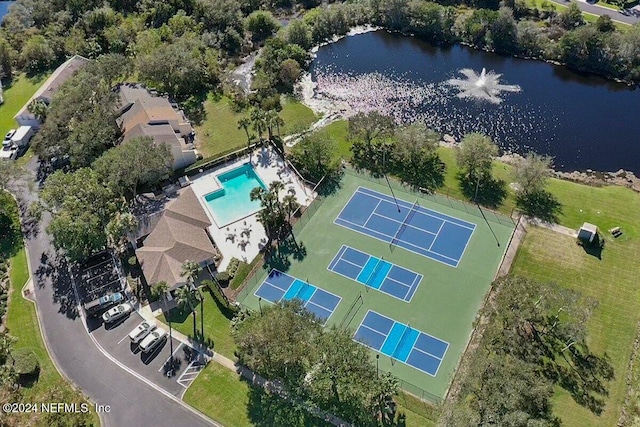 drone / aerial view with a water view