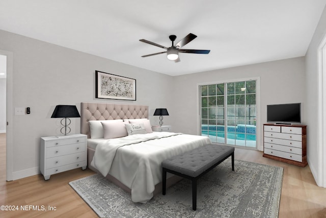 bedroom with light wood-type flooring, access to outside, and ceiling fan