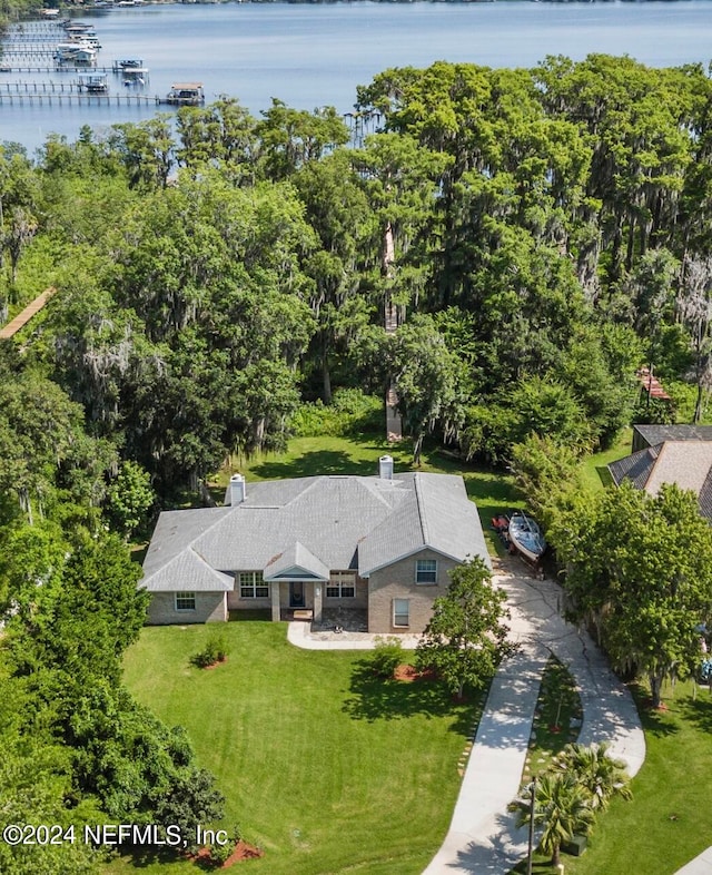 birds eye view of property featuring a water view