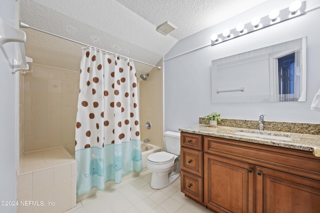 full bathroom featuring tile patterned flooring, a textured ceiling, toilet, shower / bath combo with shower curtain, and vanity